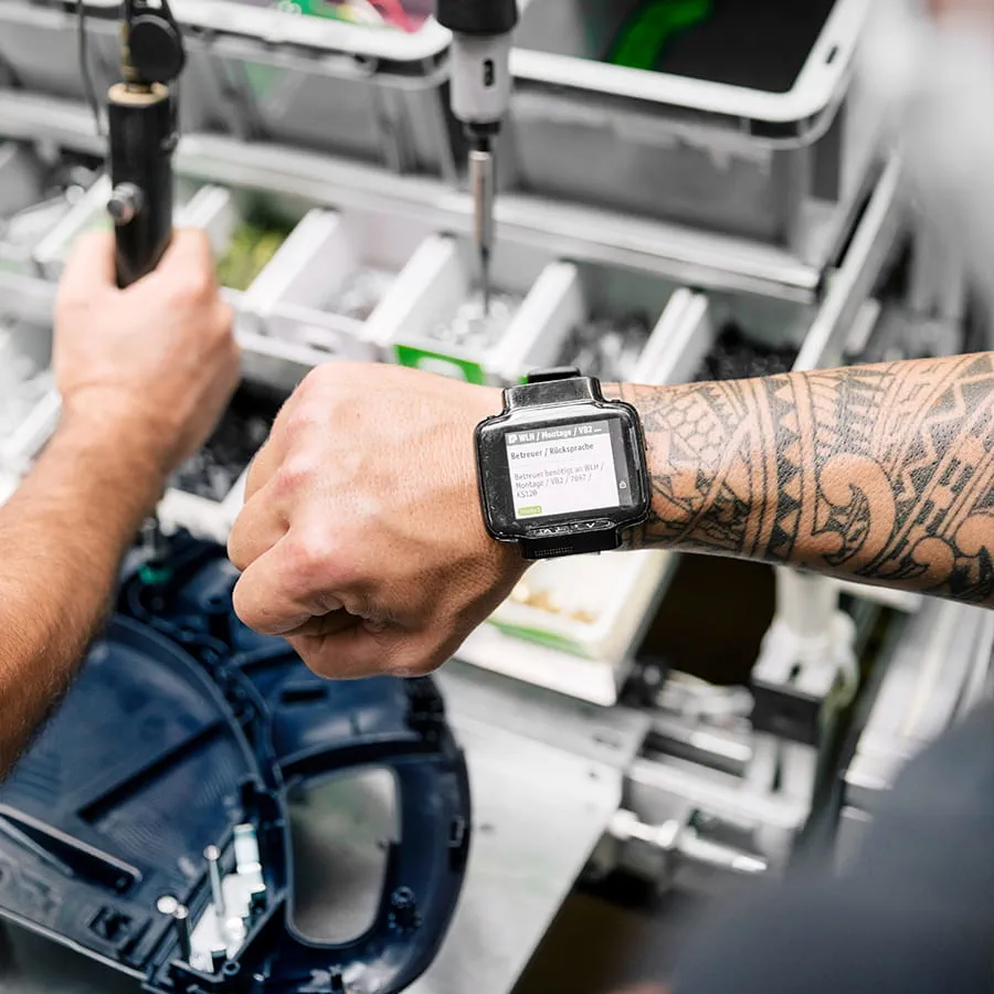 Smartwatches are used to report malfunctions or errors in the production line.