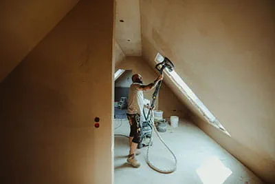 The Festool PLANEX long-reach sander in operation on the construction site