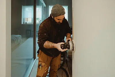 The Festool eccentric sander in operation on the construction site