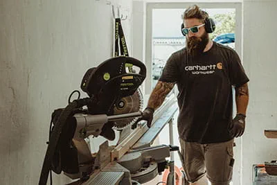 The Festool KAPEX KS 120 sliding compound mitre saw in operation on the construction site