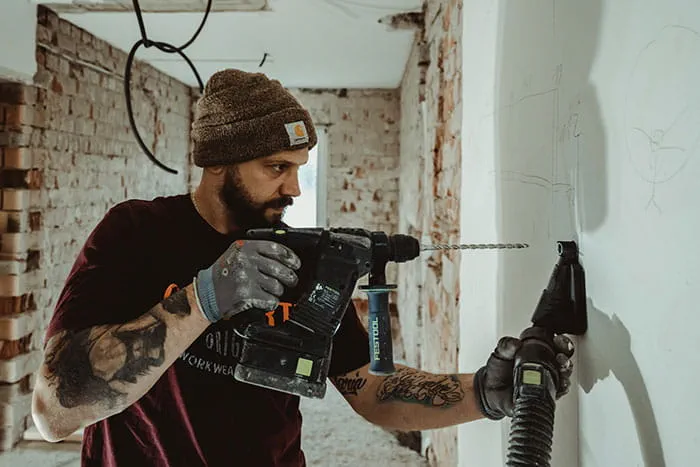 The Festool BHC 18 cordless hammer drill in operation on the construction site