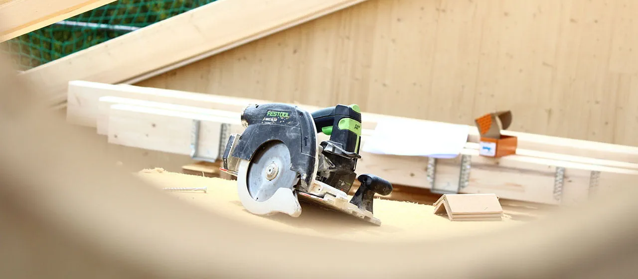 The Festool HKC 55 cordless circular saw in operation