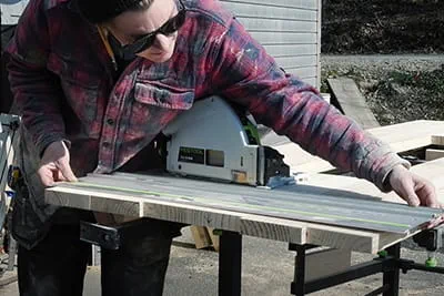 Maker Laura Kampf using the Festool TSC 55 cordless plunge-cut saw with guide rail by Festool.