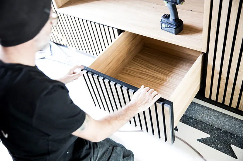 Base cabinets are fitted for the washbasins.